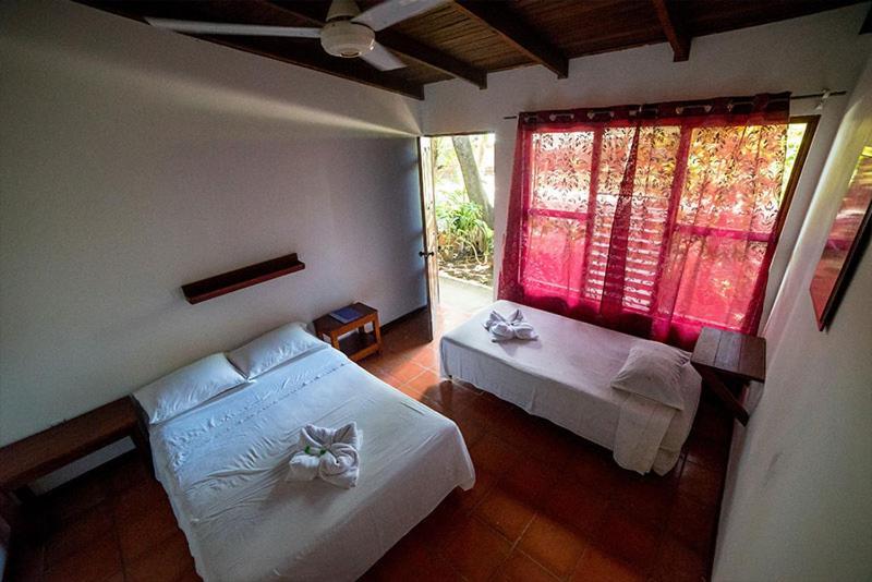 Hotel Hibiscus Cabina 4 Playa Junquillal Bagian luar foto